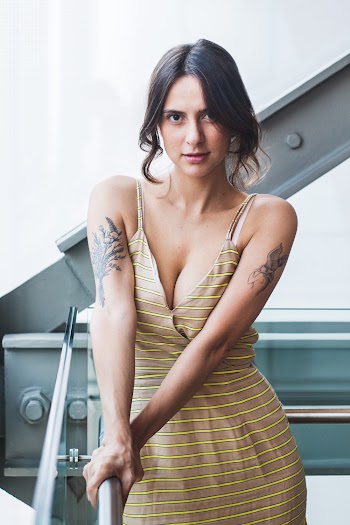 Woman Wearing Brown Spaghetti Strap Dress