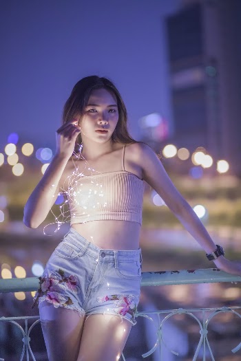 Woman Wearing Brown Spaghetti-strap Top