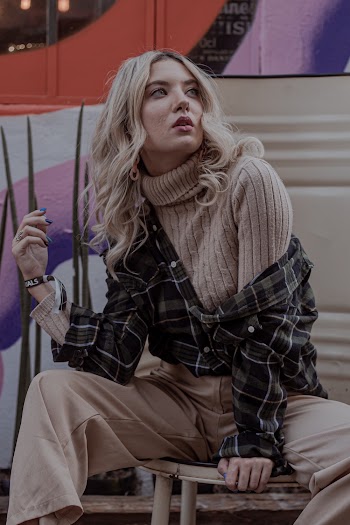 Woman Wearing Brown Turtle-neck Sweater With Gray and White Plaid Button-up Shirt