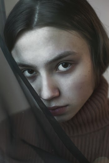 Woman Wearing Brown Turtle-neck Top