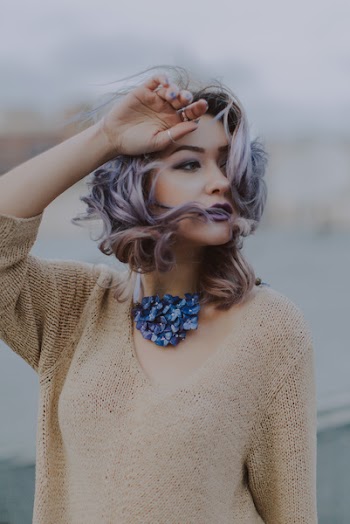 Woman Wearing Brown V-neck Knit Shirt