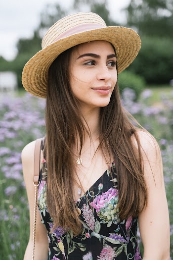 Woman Wearing Brown Wicker Hat