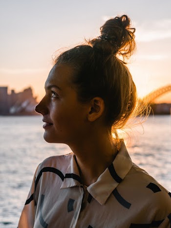 Woman Wearing Button-up Collared Shirt