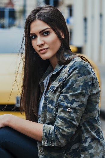 Woman Wearing Camouflage Jacket