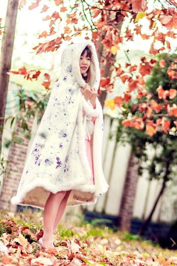 Woman Wearing Cloak