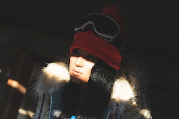 Woman Wearing Coat and Hat