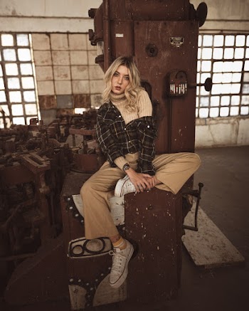 Woman Wearing Cream Turtle Neck Top and Checkered Jacket