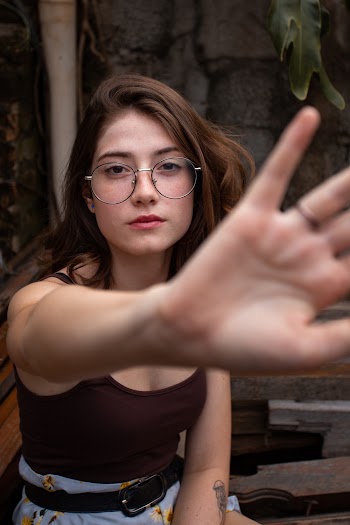 Woman Wearing Eyeglasses and Brown Tank Top