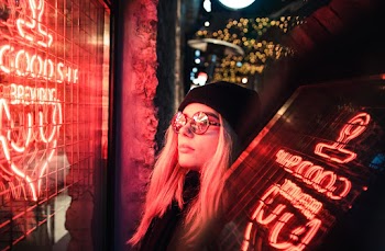 Woman Wearing Eyeglasses Watch Neon Light Signage
