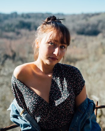 Woman Wearing Floral Blouse