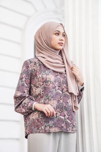 Woman Wearing Floral Dress Shirt and Hijab