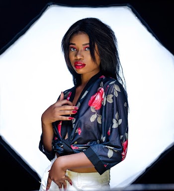 Woman Wearing Floral Silk Top