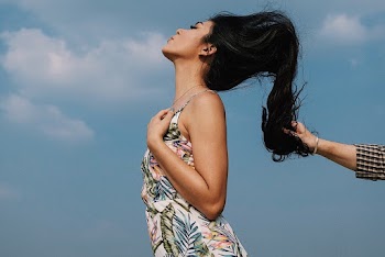 Woman Wearing Floral Spaghetti-strap Top