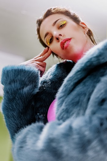 Woman Wearing Fur Coat