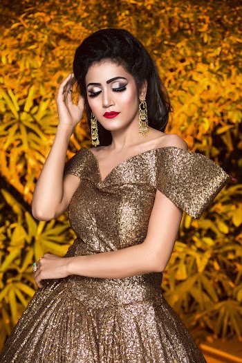 Woman Wearing Gold Dress