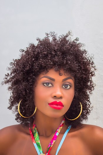 Woman Wearing Gold Hoop Earrings