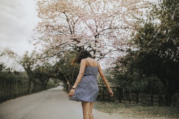 Woman Wearing Gray and Black Spaghetti Strap Dress