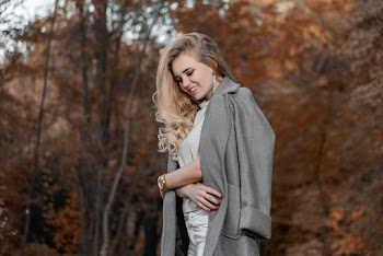 Woman Wearing Gray Blouse With Gray Trench Coat
