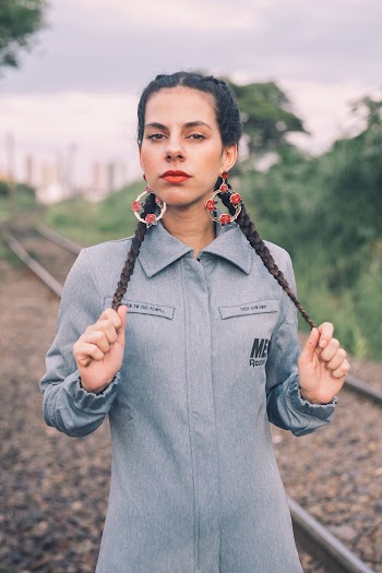 Woman Wearing Gray Collared Dress Near Train Rails