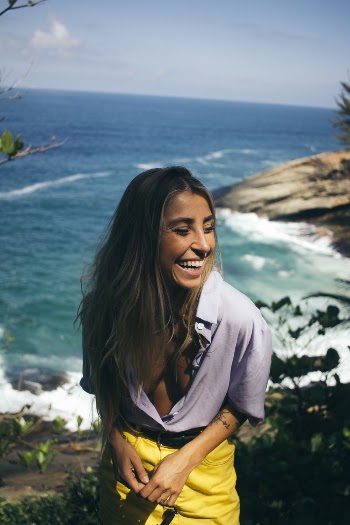 Woman Wearing Gray Collared Top While Smiling