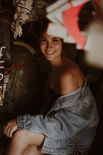 Woman Wearing Gray Denim Jacket Smiling