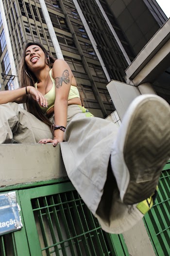 Woman Wearing Gray Flare Pants