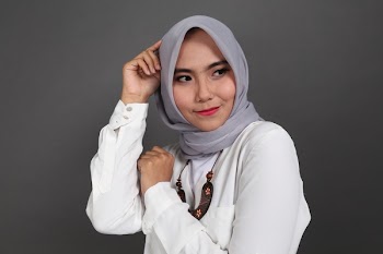 Woman Wearing Gray Hijab Headscarf and White Tops