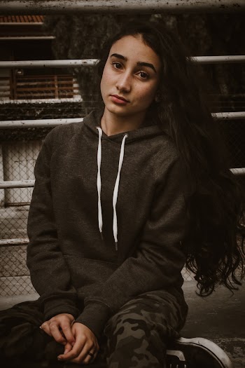 Woman Wearing Gray Hoodie
