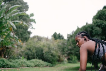 Woman Wearing Gray Sports Bra