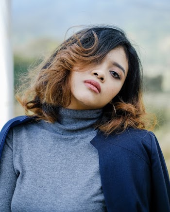 Woman Wearing Gray Turtleneck Top