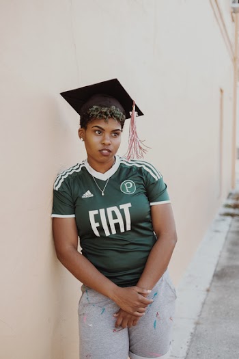 Woman Wearing Green Adidas Jersey 