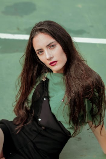 Woman Wearing Green and Black Dress