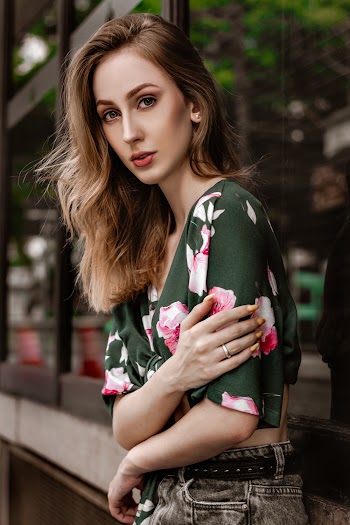 Woman Wearing Green and Pink Blouse