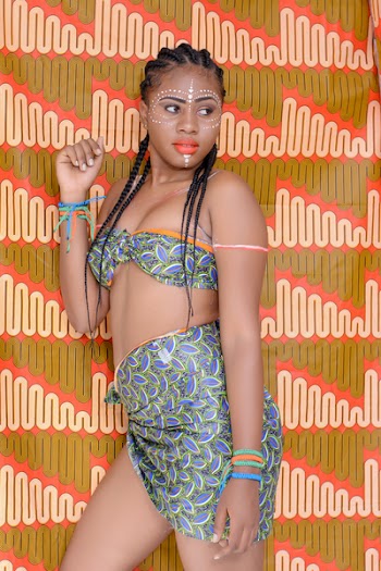 Woman Wearing Green and Purple Traditional Dress
