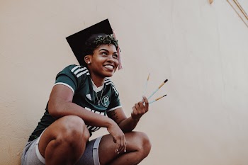 Woman Wearing Green And White Adidas Jersey Shirt 