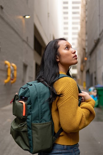 Woman Wearing Green Backpack