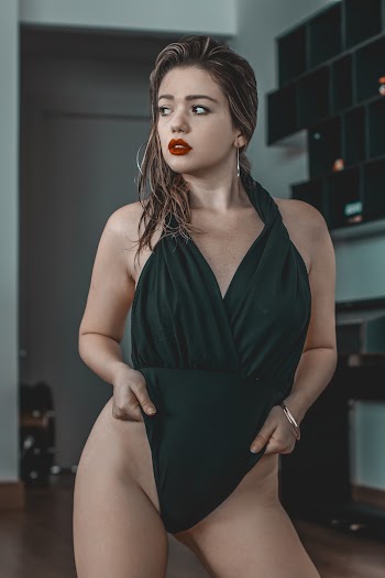 Woman Wearing Green Bathing Suit