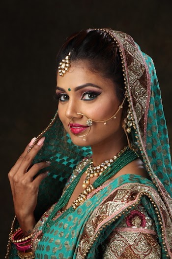 Woman Wearing Green, Brown, and Pink Sari Dress Portrait Photograph