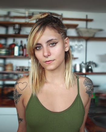 Woman Wearing Green Camisole