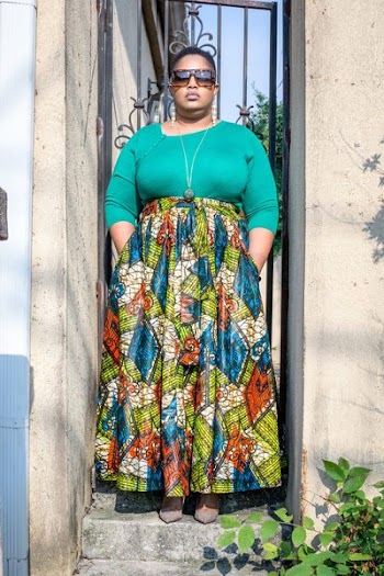 Woman Wearing Green Long-sleeved Shirt and Printed Skirt