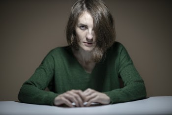 Woman Wearing Green Sweater