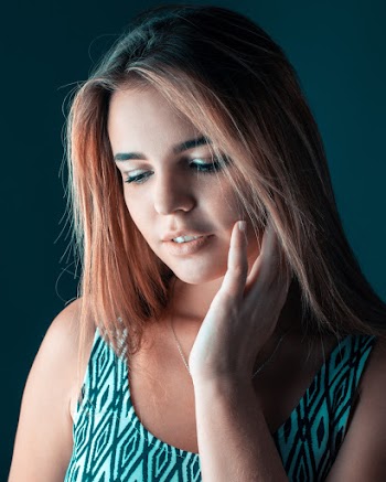 Woman Wearing Green Tank Top