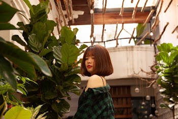Woman Wearing Green Top