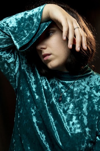 Woman Wearing Green Velvet Shirt