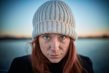 woman wearing grey hat while selfie