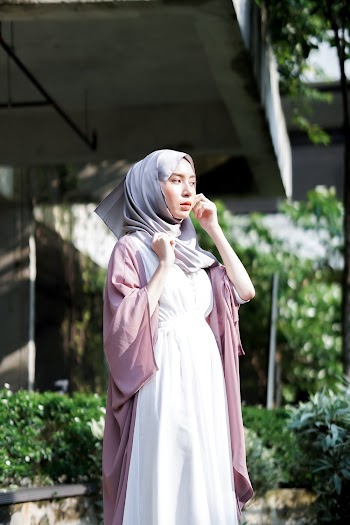 Woman Wearing Grey Hijab Inside Room