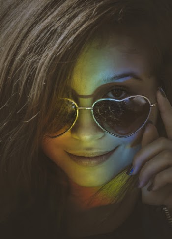 Woman Wearing Heart Shape Sunglasses