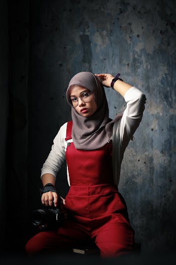 Woman Wearing Hijab And Red Jumpsuit