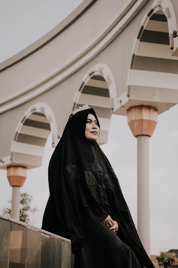 Woman Wearing Hijab Sitting Down
