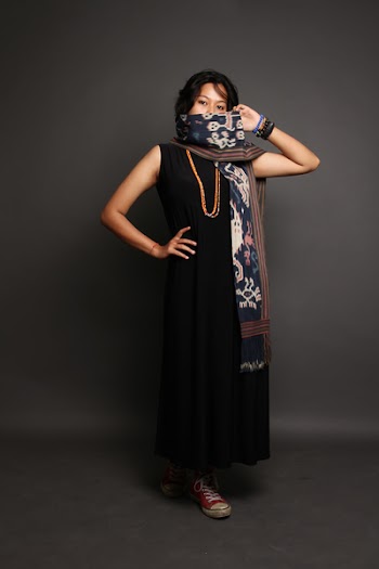 Woman Wearing Infinity Scarf and Sleeveless Dress